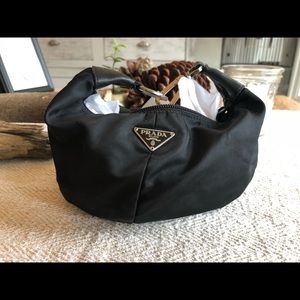 Beautiful Prada black clutch with leather details